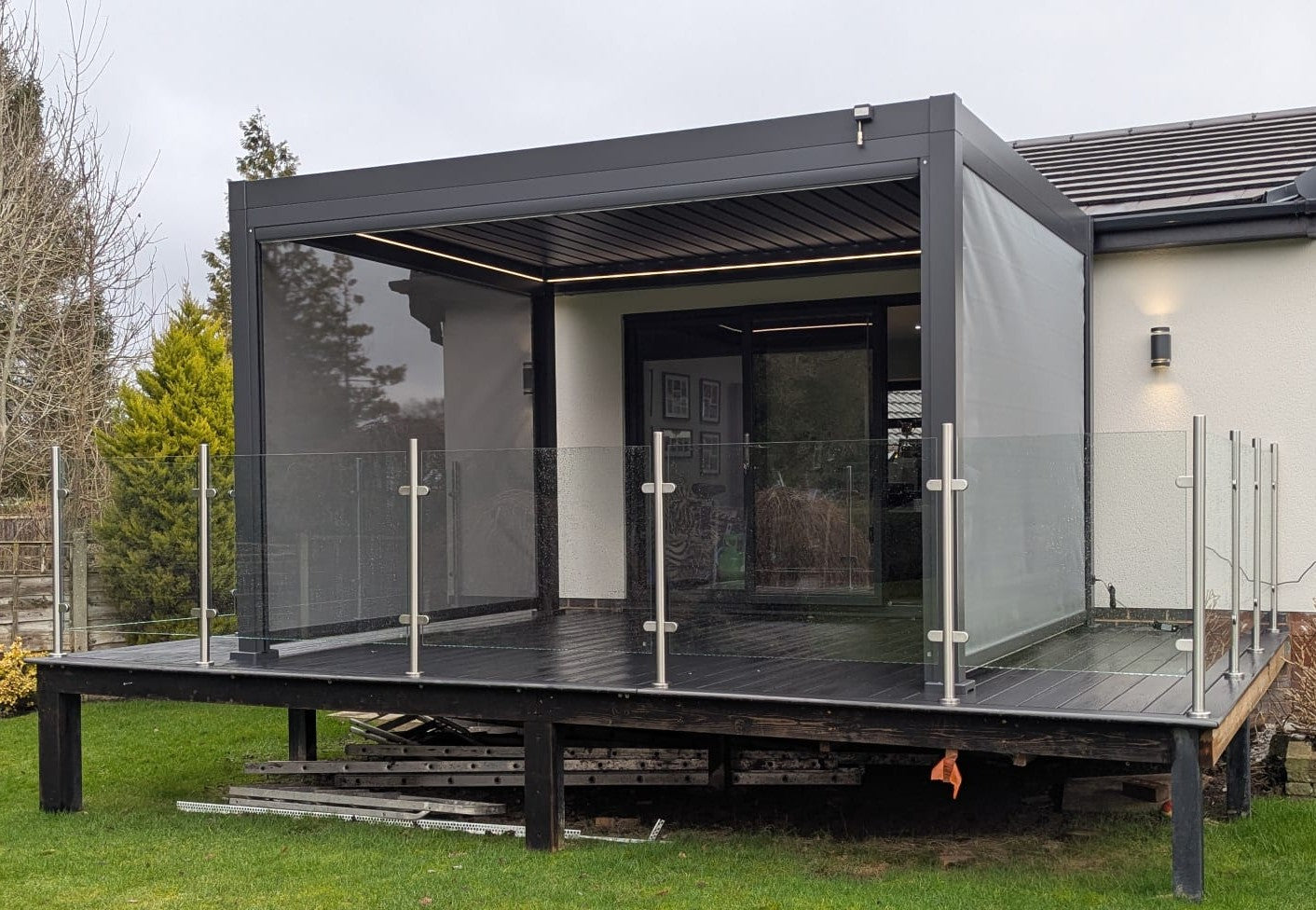 LuxShade™ 3×4m Aluminium Pergola with LEDs, Double-Layered Louvred Roof & 3 Blinds