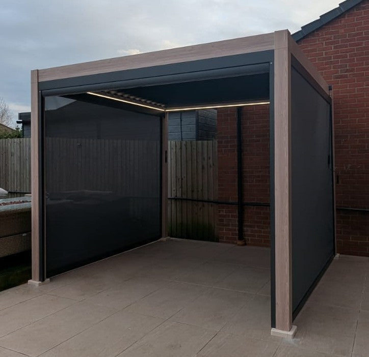LuxShade™ 3×3m Aluminium Pergola – LEDs, Double-Layer Louvres & 3 Windscreens - Oak Effect